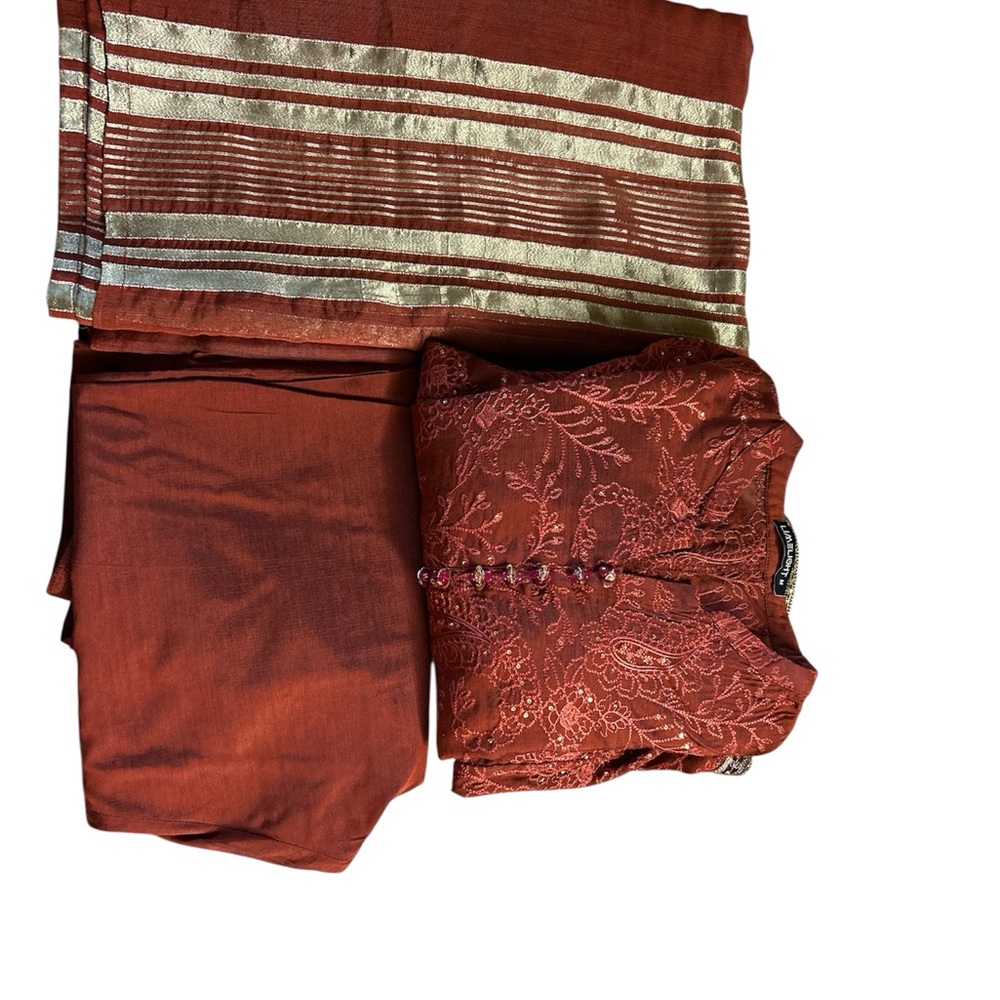 Paksitani limelight Elegant Rust Red and Silver Embroidered Outfit fall wear